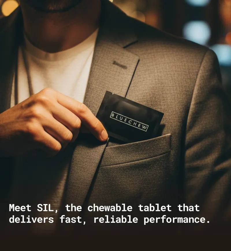 professional man putting bluechew packet in his pocket
