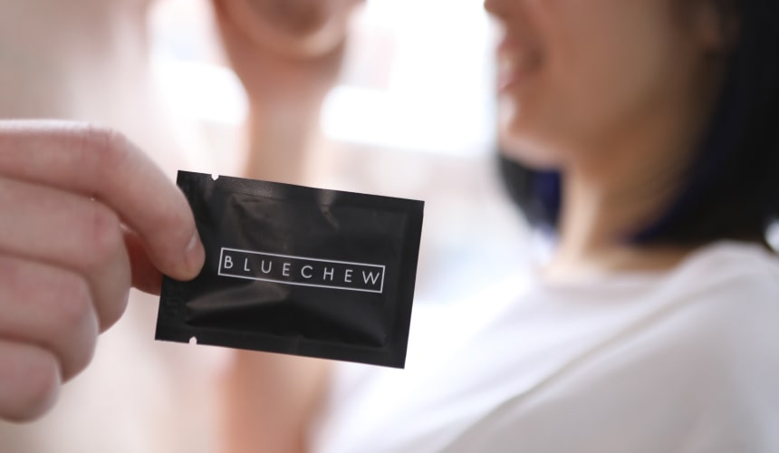 bluechew pouch on a nightstand