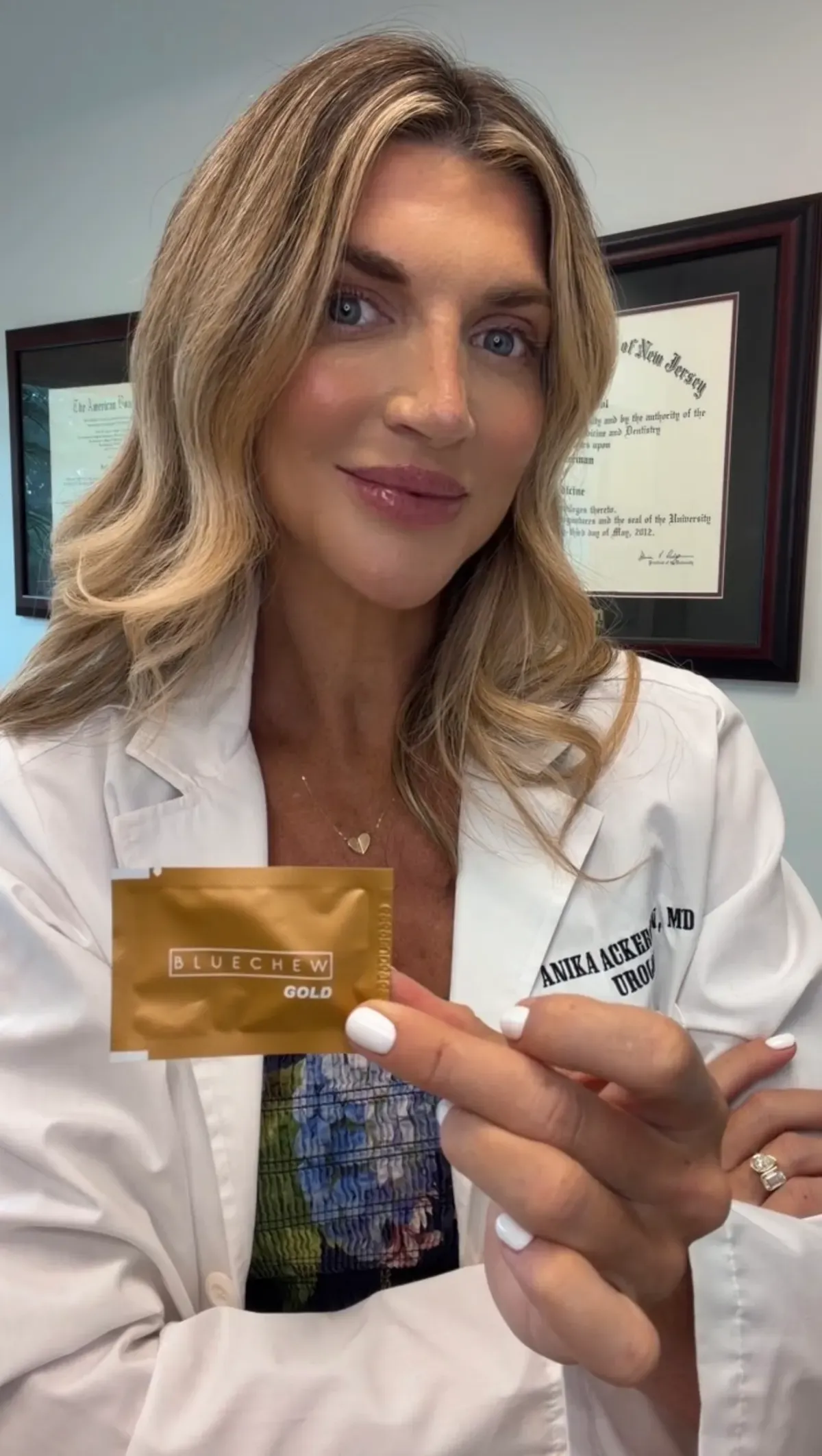 Dr. Anika Ackerman doctor holding bluechew gold