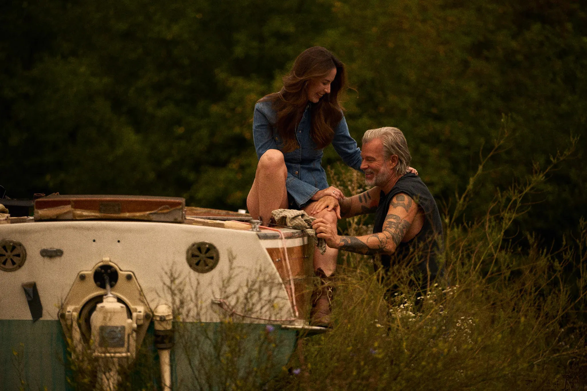 happy couple with bluechew gold in country on boat